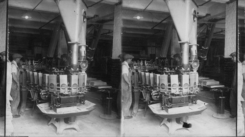 Machine filling cartons with sugar, St. John, N.B, Canada