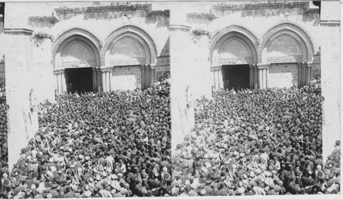 Pilgrims struggling to reach the “Holy Fire” Church of the Holy Sepulchre, Jerusalem, Palestine