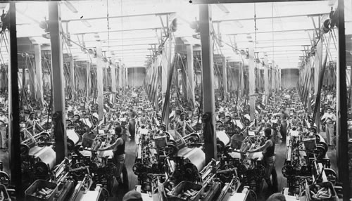 Weaving home grown cotton for the South American trade in a fine modern mill at Lima. Peru