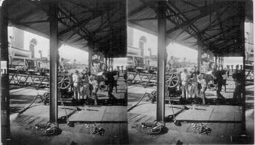 Loading bananas on a train. Costa Rica