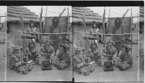 Ainu men, the aborigines of Japan, in feast attire, Island of Yezo