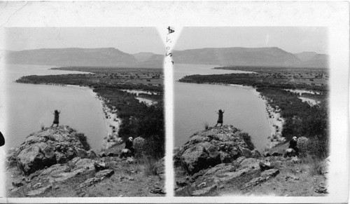 West shore of Galilee, Plain of Gemmesoret and Mt. of Beautitudes, from Bethsaida, Palestine