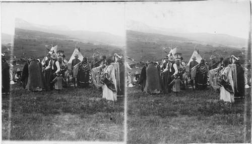 A Group of Blackfoot Indians and Their Tepees. Glacier National Park. Montana