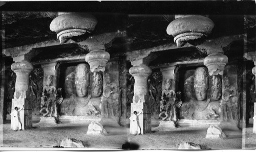 The Trimurti of Three-faced Bust of Shiva, 19ft high Elephanta Cave, near Bombay. India