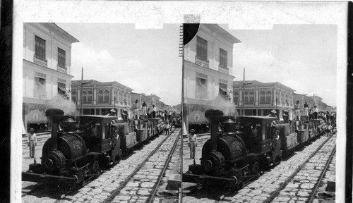 How imported goods are carried from Custom House - railway along street in Guayaquil, Ecuador