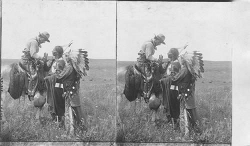 Cowboy and Indians talking in sign language. Oklahoma. [By Boardman 1905. PW 5-6-1984]