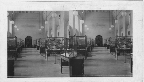 Interior of one main room of Rockefeller Museum, Palestine Department of Antiquities. This room is arranged from the earliest Paleolithie times (nearest the camera) to the end of the Late Bronze Age (1200 B.C.)