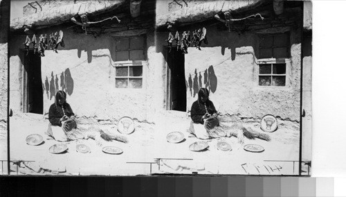 Oraibi Woman Making Basket, Hopi Indian Reservation, Ariz