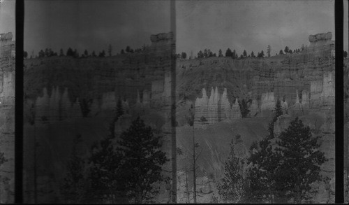 Looking west in the "Queen's Garden" to group showing "Queen Victoria" the smallest of the group at left. Bryce Canyon. Utah. Bryce