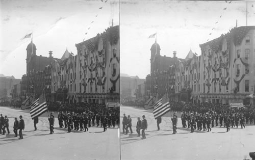 The "Old Heroes" - Their rank sadly decimated by years. Marching beneath their honored flag