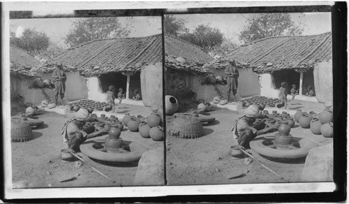 Pottery maker turning out his wares. India