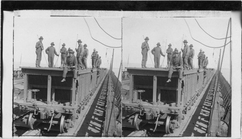 Dumping 50 ton ore cars, St. Paul Ore Docks, North Escanaba, Michigan