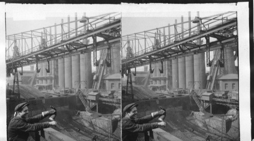 Detail view of blast furnaces showing feed buckets ascending. Homestead, Penna