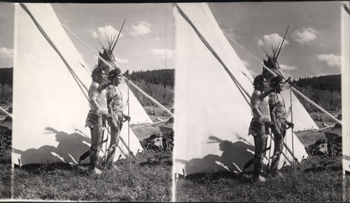 Modern Blackfeet Braves Holding Coup Sticks. Glacier National Park, Montana