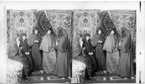 Turkish women in street costume, before adjusting veils, (Coffee drinkers of the world) Turkey