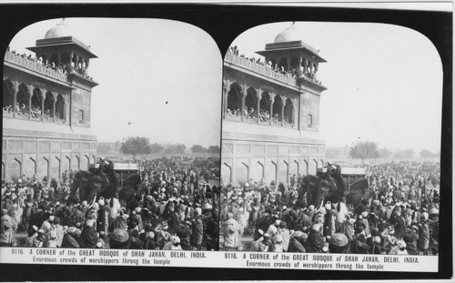 Inscribed in recto: 9116. A CORNER of the GREAT MOSQUE of SHAH JAHAN, DELHI, INDIA. Enormous crowds of worshippers throng the temple