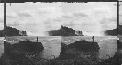 Superbly Beautiful, the Horseshoe Falls and its cloud of mist from the rocks below the new Steel Arch Bridge, N.Y