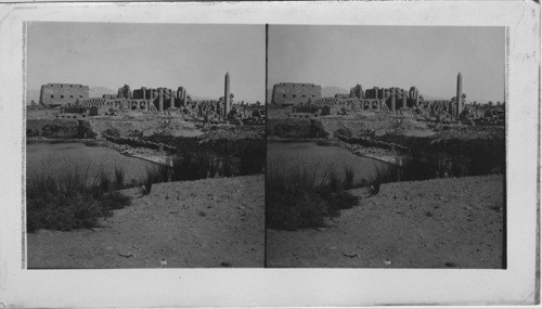 Distant view of the Ruins of Karnak, Looking N. W. across Sacred Lake, Egypt