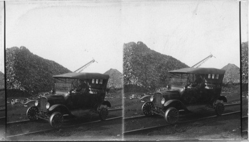 Ford Car on Abitibi R.R. Pulpwood in Background, Abitibi Power & Paper Co. Ont