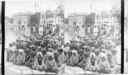 School boys of Amritsar at Golden Temple beside the Holy Tank. Amitsar. India