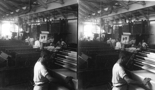 Finishing processes for silk cloth - breaking, folding and pressing in a Paterson silk dying works, New Jersey