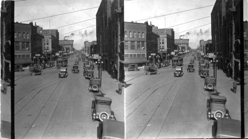 Looking North on Main St. from 1st & Main Sts., Chamber of Commerce Bldg. at right, Pueblo, Colo