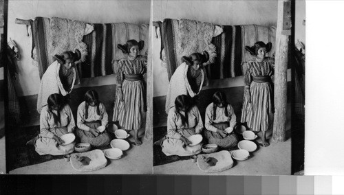 Primitive Artists, Indian women decorating pottery, Hopi Reservation, Arizona