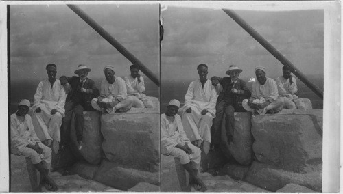 Resting on top of Great Pyramid, Cairo, Egypt