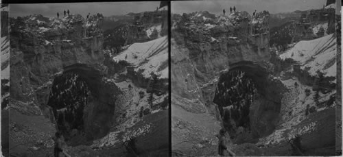 Natural bridge in Willis Creek near Bryce Canyon. Looking a little south of east. Life is not so good because guide with horse came near camera to have guide pose in foreground - and again the stereograph is so deficient that you get no idea of topography - this stop was so steep that few would venture down & the guide had to lean back not to fall - the knoll you speak as being in from t of him is hundred of feet below & so steep that a man would have to roll down like a stone to get there - Utah. Have made autochrome of this