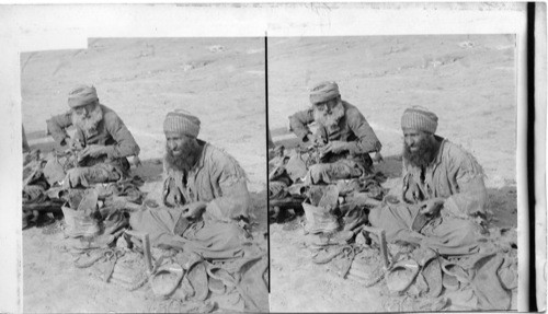 Jewish Cobblers Repairing Shoes for Arabs, near Mosul, Mesopotamia