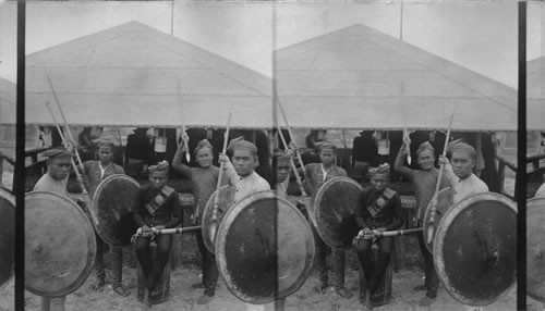 A Prince and Four of his Slaves. Philippine Concession. Jamestown Exposition. Virginia