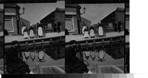 A scene along one of the canals. Volendam, Holland. Scene in a Netherlands Village