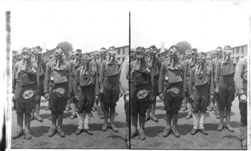 American, camp scene. Soldiers of Co. M. 312 Inf. with gas masks adjusted Camp Dix. N.J