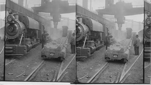 Stripping moulds fro ingots. Pittsburgh, Penna