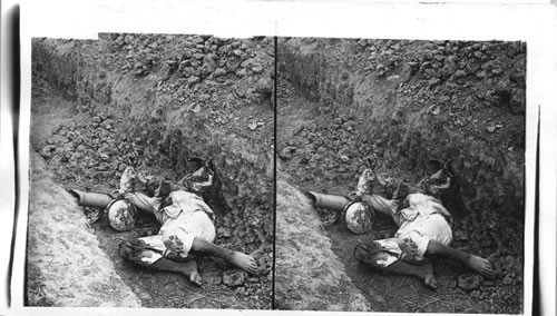 The necessary results of war - an insurgent killed insurgent killed in the trenches at the Battle of Malabon, Philippine Islands