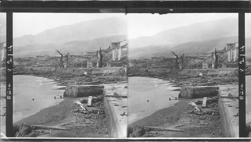 On the water front of St. Pierre where houses are buried three or four feet deep in volcanic mud, Martinique, Lesser Antilles