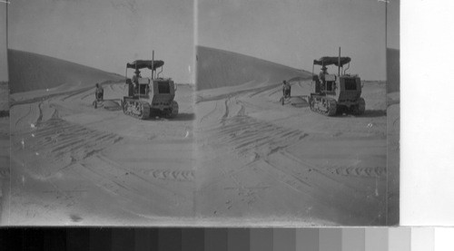 After a sandstorm-Dept. of Highway-clearing out the road. Southern Calif.-near Thermal Sand Drift