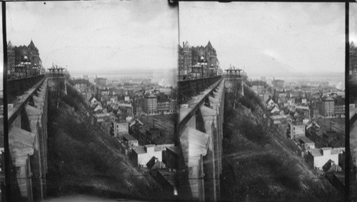 A view of Old Town below the Citadel with St. Lawrence River & C.P. Steamship Empress of Britian from Dufferin Terrace with part of Chateau Frontenac looking N.E. Canada