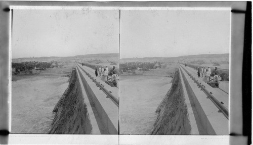 The Nile flowing through light gates of the dam at Assouan