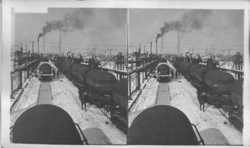 In the R.R. yard of an Oklahoma Refinery - filling tank cars