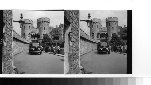 Windsor: the Norman gateway, which is more correctly called the inner gatehouse. It is not Norman construction but was built during the 14th century. This narrow archway flanked by the two large drum towers was a state prison until the 17th century. King John of France and his son Philip were imprisoned here after capture at Poitiers in 1356 and David II [2nd] of Scotland was there, having been captured in 1346. James I of Scotland was also imprisoned there from 1413-24. The lieutenant-governor of the castle has this gatehouse for his residence nowadays