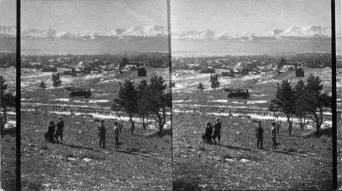 A little west of south, looking over Leadville, Colorado to Mt Massive. 14424 ft. over tree top, & at right Mt. Elbert 14421 ft. - at left Lake County, Colo