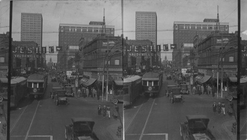 N.W. on Main St. from 10th & Main St., to Court House in distance, at right close up of Texas Hotel Bldg. Fort Worth, Texas