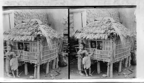 Filipino children in their playhouse, Luzon, Philippine Islands