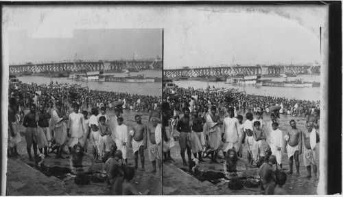 Typical natives in crowd on Hooghly River bank at Calcutta