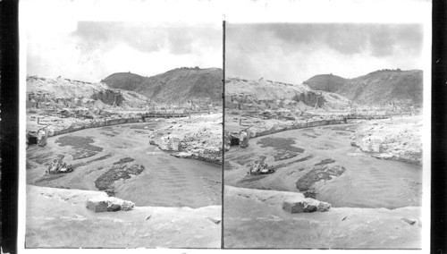 Roxelane River Valley, once filled with charming homes - from bridge covered with Mont Pelee's volcanic dust. North America