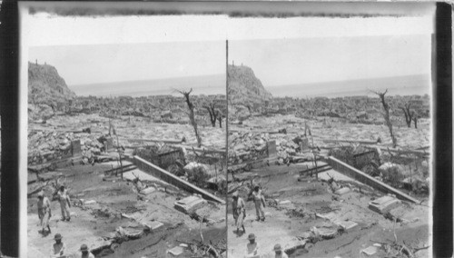 Tombs of the once beautiful cemetery, from boulevard over the ruined city to base of Orange Hill, St. Pierre. Martinique