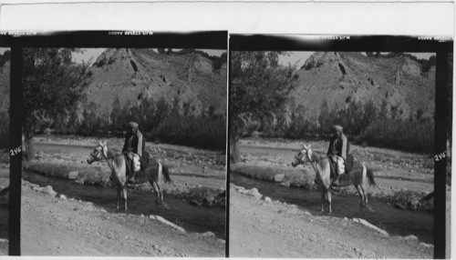 245 Afghan riding to the village. Photo taken in the Ghorbend Valley on way to Bamian