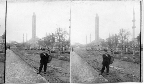 St. Sophia Mosque (distant) obelisk and column on site of old Roman hippodrome, Constantinople, Turkey