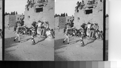 Jesters and sacred "rain bringers" (Kachinas) Hopi Indian Village of Oraibi, Ariz